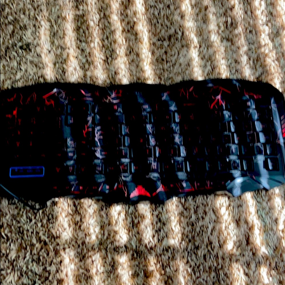 A Wired Keyboard With Led Lights - image 1